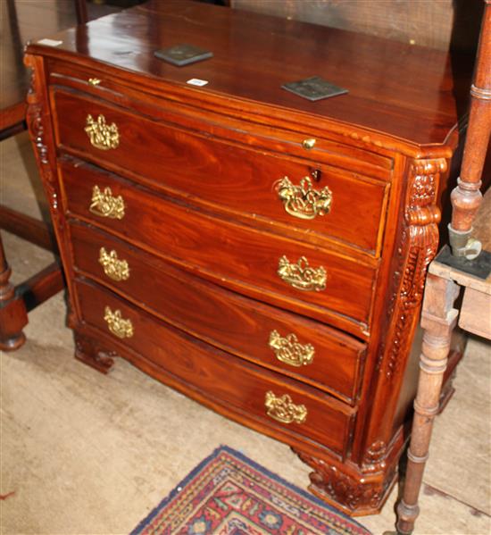 Serpentine mahogany chest of drawers